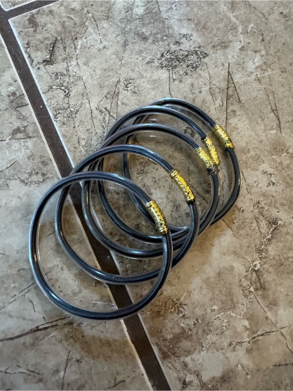 Set of Black Bangles with Gold Accent